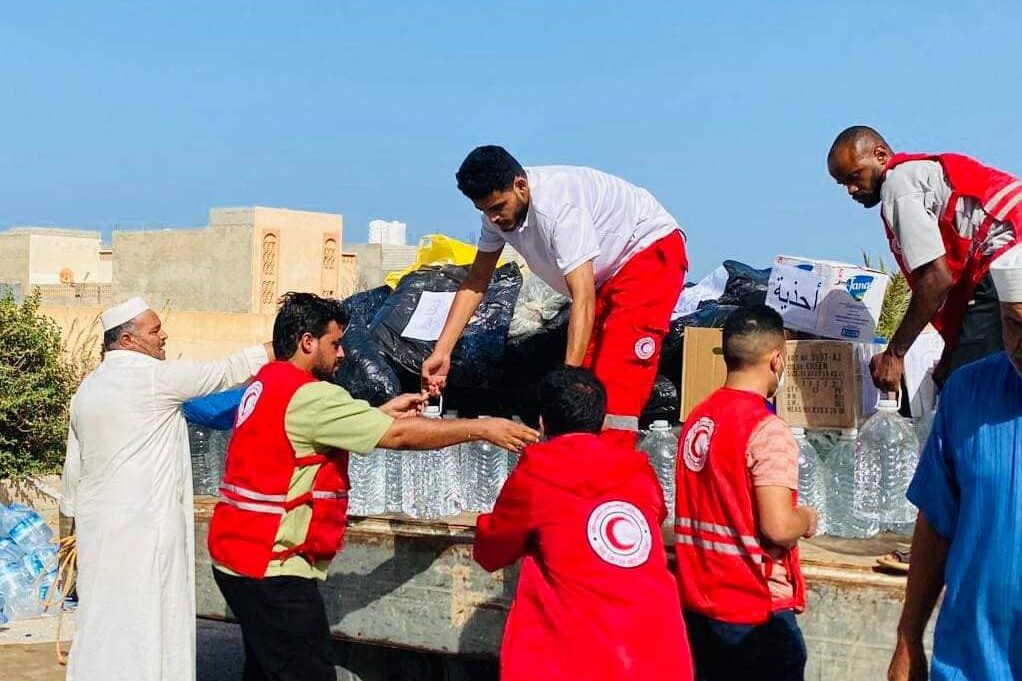 SPP members volunteering for the Red Crescent, unloading aid trucks sent from west Libya.